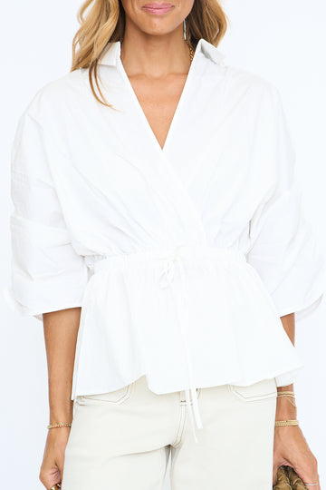 Peplum Poise Top