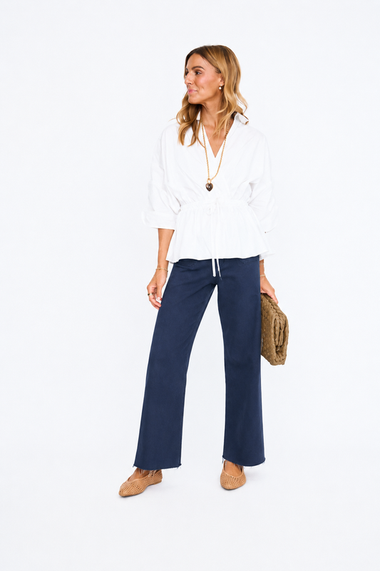 Peplum Poise Top